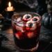 Cocktail Halloween avec des yeux en litchi et myrtille